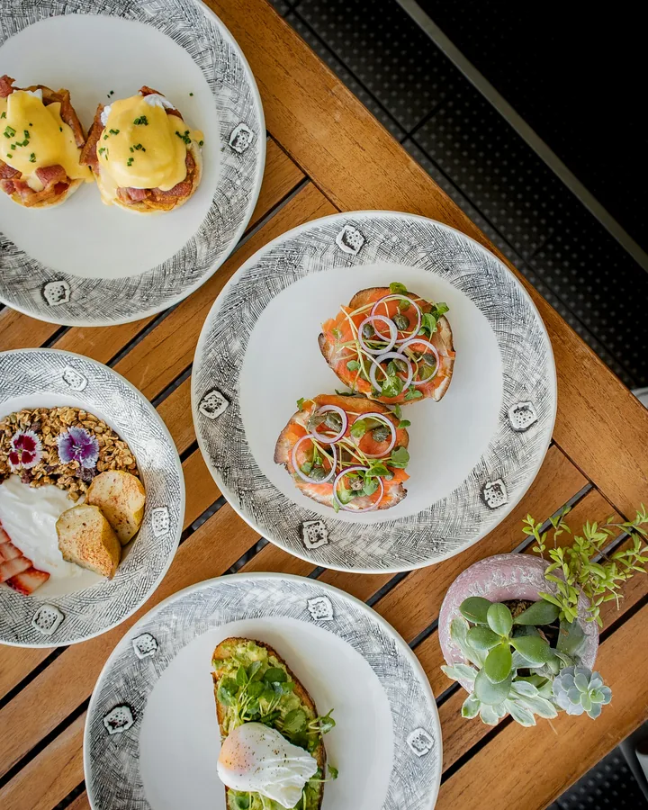 Four different brunch plates chosen for the same table